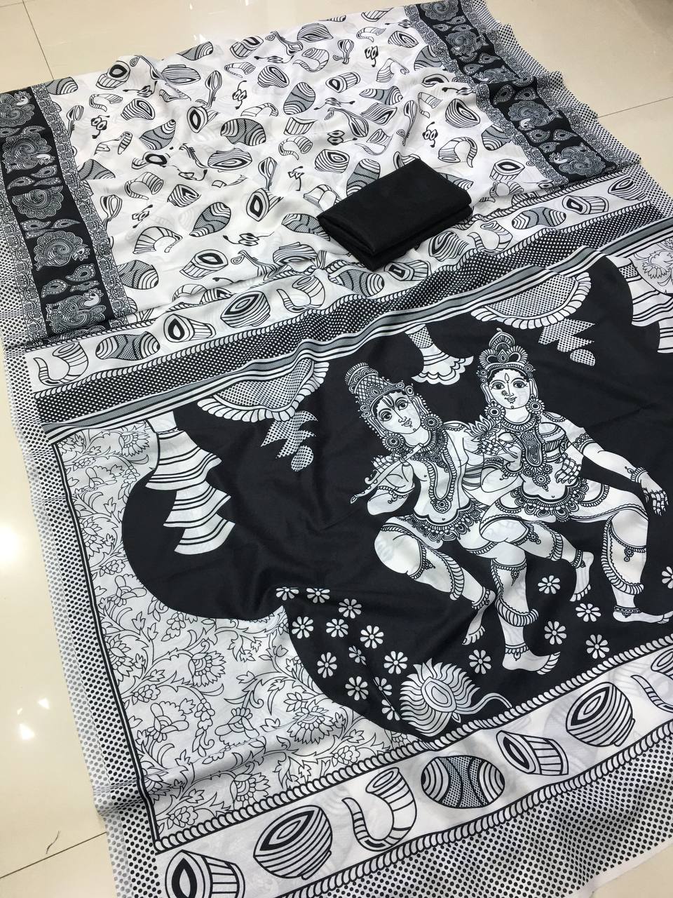 White And Black Color Dholka Digital Printed Linen Saree.