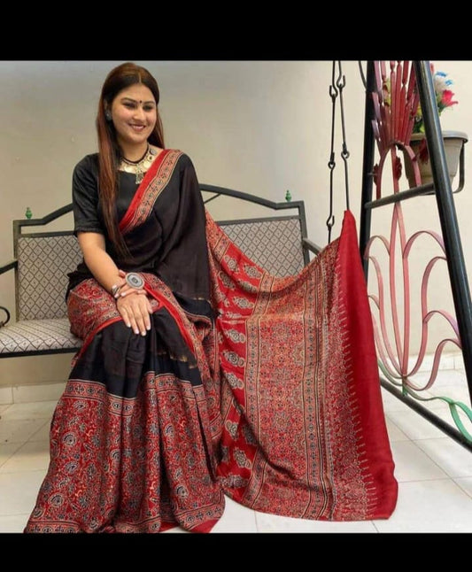 Design black and red pallu ajrakh saree